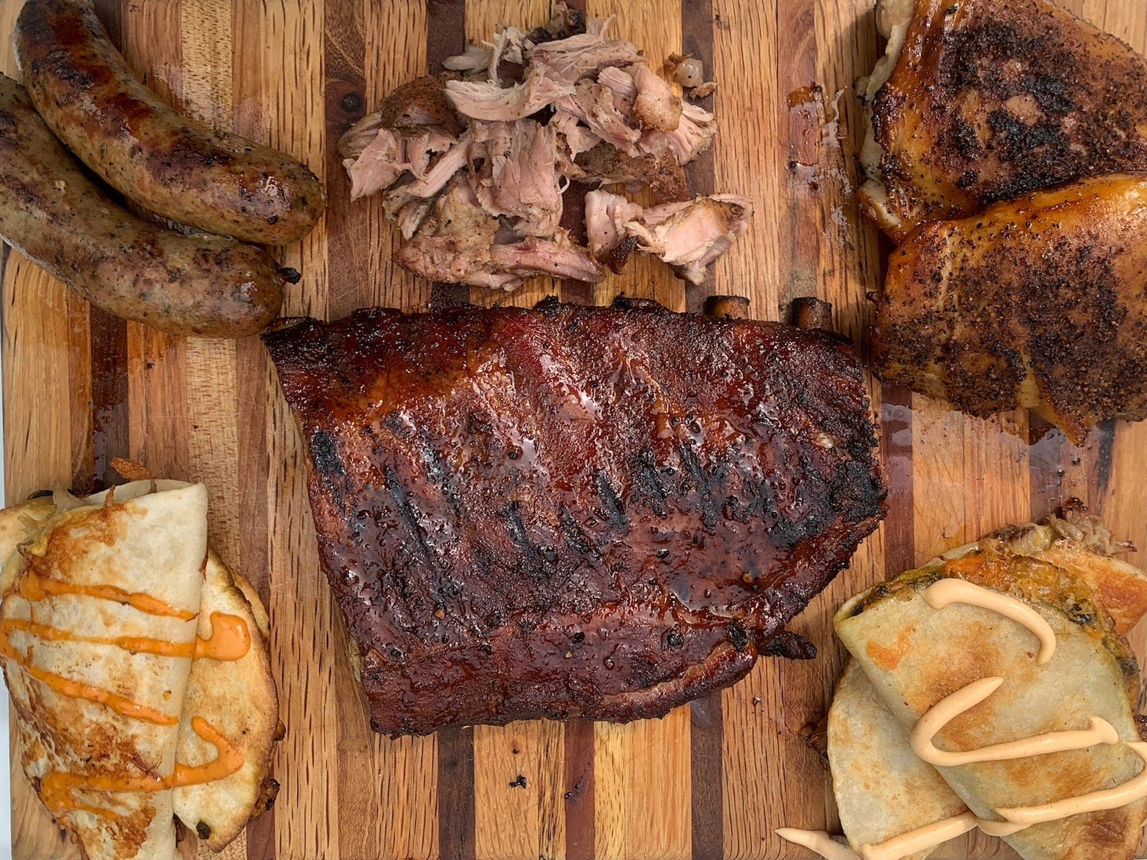 Coops Table New Orleans BBQ Platter with pulled pork, boudin, chicken